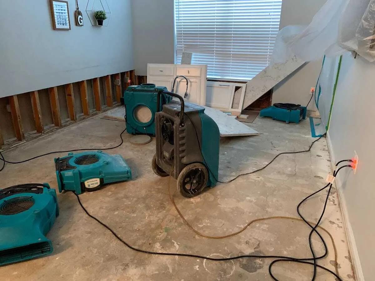 Dehumidifier in flood-cut room for Water Damage Restoration in Elmwood Park